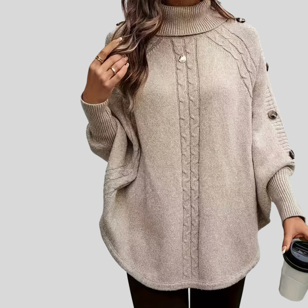 Léa poncho met col en kabelpatroon
