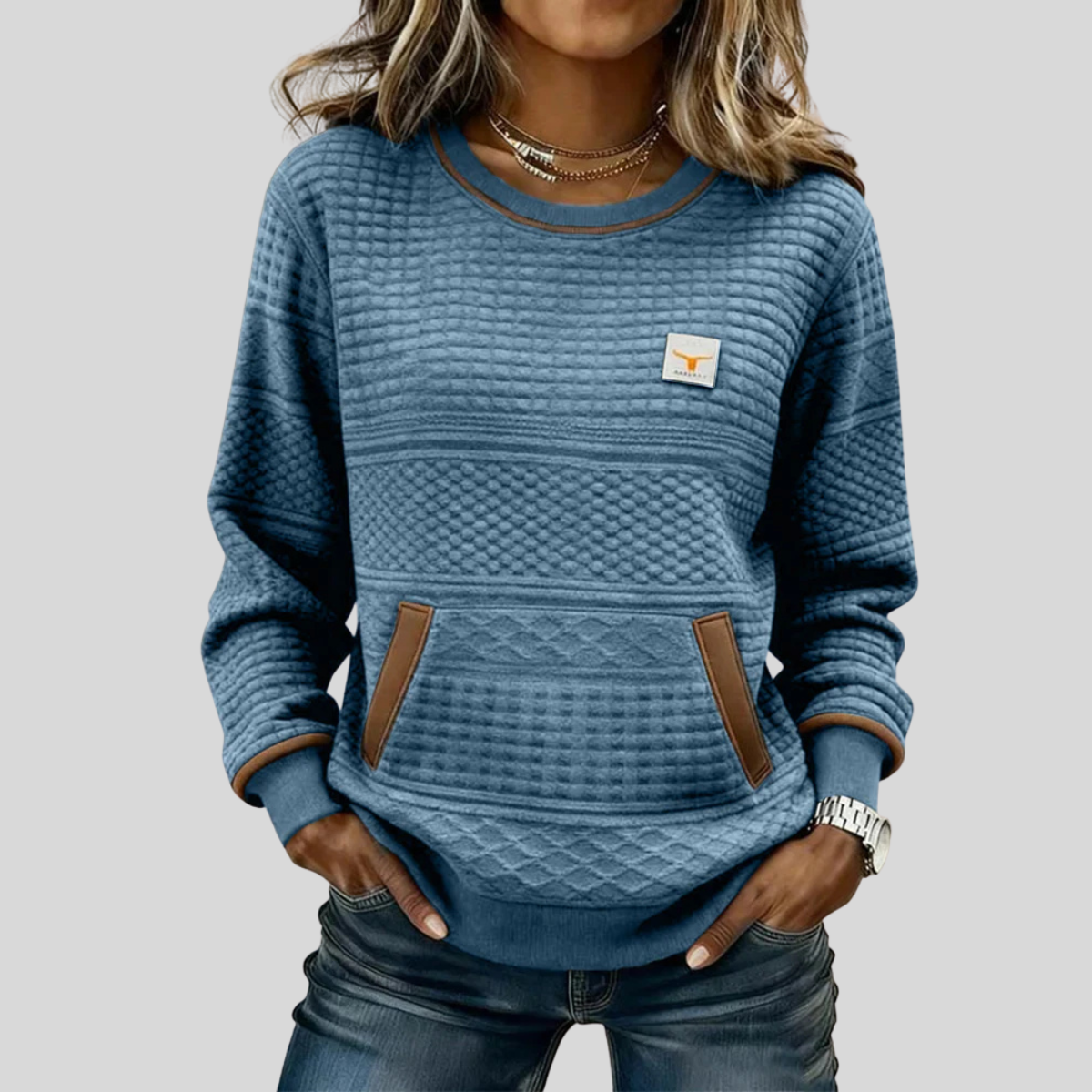 Bérénice gewatteerde sweater met ronde hals