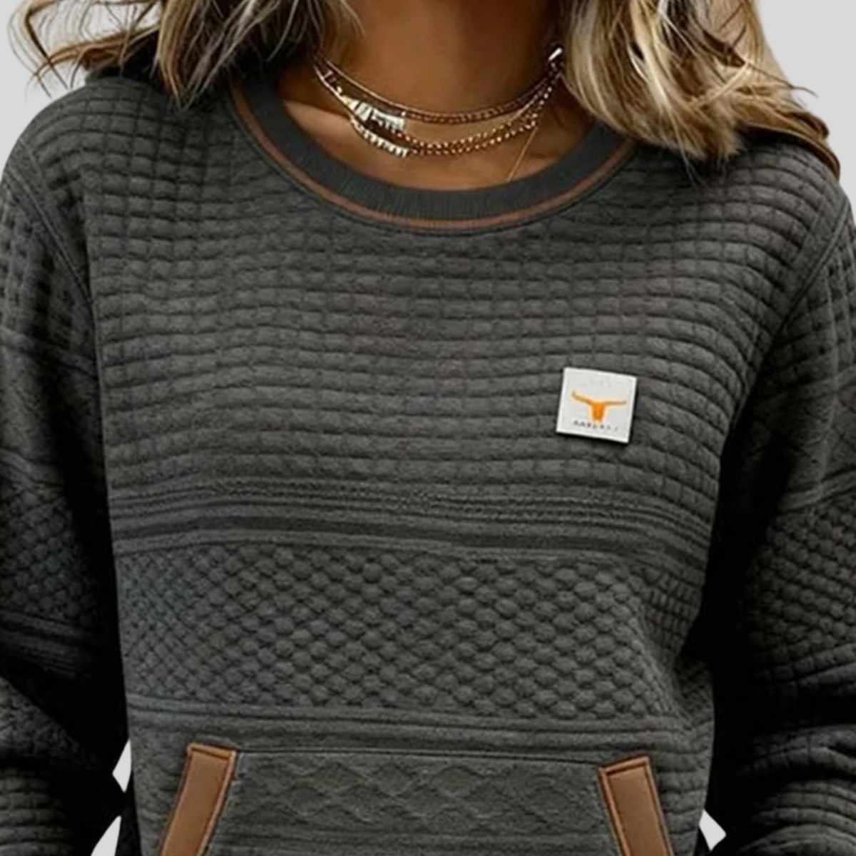 Bérénice gewatteerde sweater met ronde hals
