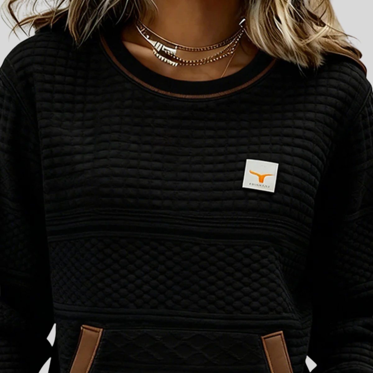 Bérénice gewatteerde sweater met ronde hals